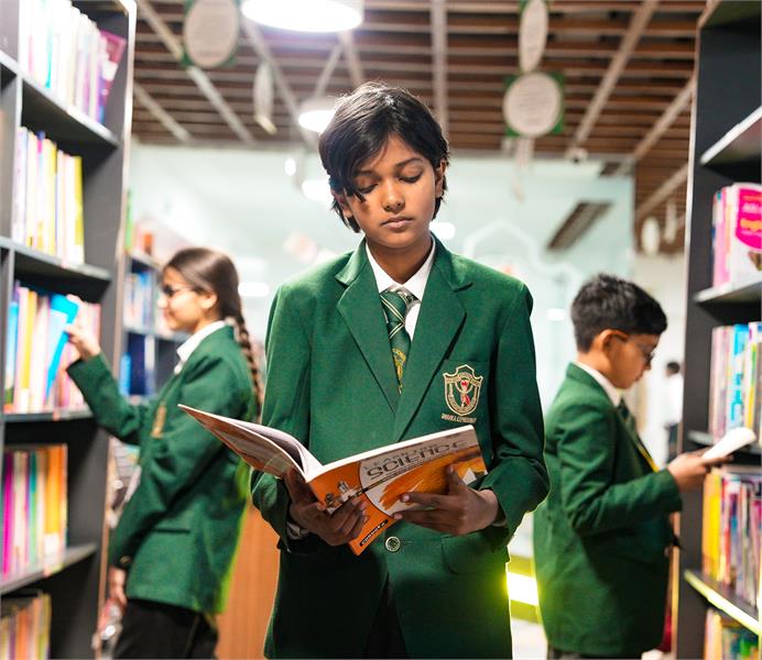 Student reading in library